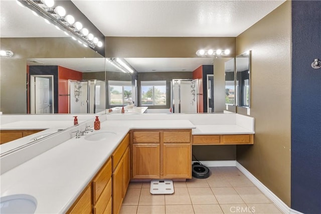 7311 Pinewood Ct, Eastvale, CA 92880 - bathroom featuring a stall shower, tile patterned floors, baseboards, and vanity