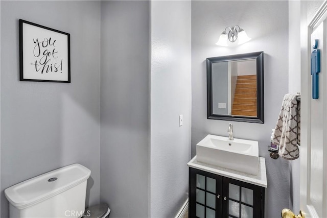 7311 Pinewood Ct, Eastvale, CA 92880 - half bathroom featuring toilet and vanity