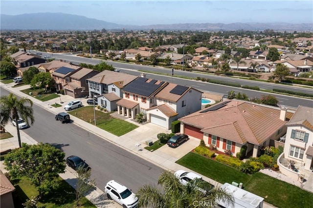 7311 Pinewood Ct, Eastvale, CA 92880 - aerial perspective of suburban area with mountains