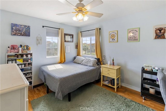 7311 Pinewood Ct, Eastvale, CA 92880 - bedroom featuring wood finished floors, a ceiling fan, and baseboards