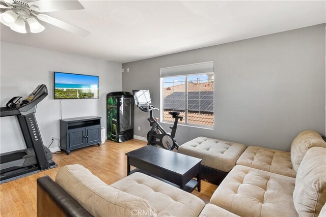 7311 Pinewood Ct, Eastvale, CA 92880 - living room featuring light wood-style floors, ceiling fan, and baseboards