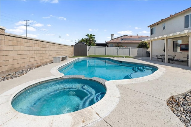 7311 Pinewood Ct, Eastvale, CA 92880 - view of pool featuring a pool with connected hot tub, a fenced backyard, a patio area, and a pergola