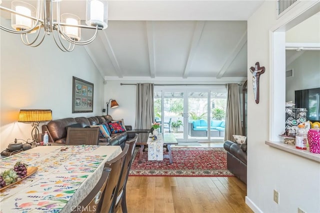 16511 Caminito Vecinos Unit 59, San Diego, CA 92128 - dining room with wood finished floors and a chandelier