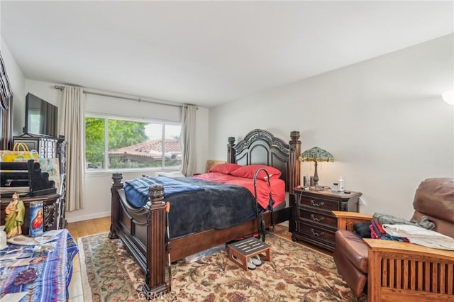 16511 Caminito Vecinos Unit 59, San Diego, CA 92128 - bedroom with wood finished floors and baseboards