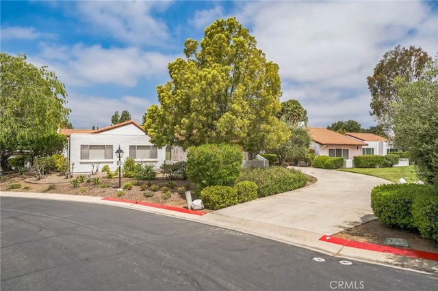 16511 Caminito Vecinos Unit 59, San Diego, CA 92128 - view of front facade featuring curved driveway