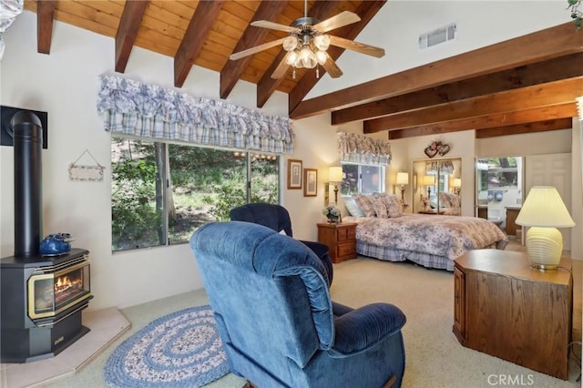 24571 Albrun Dr, Crestline, CA 92325 - bedroom with carpet floors, a wood stove, multiple windows, and wood ceiling