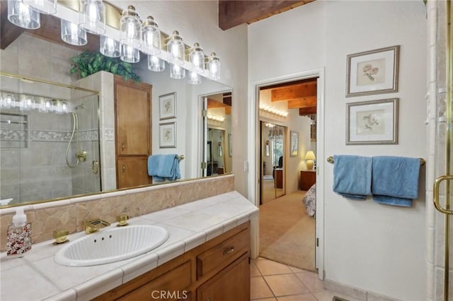24571 Albrun Dr, Crestline, CA 92325 - ensuite bathroom with a shower stall, vanity, and tile patterned flooring