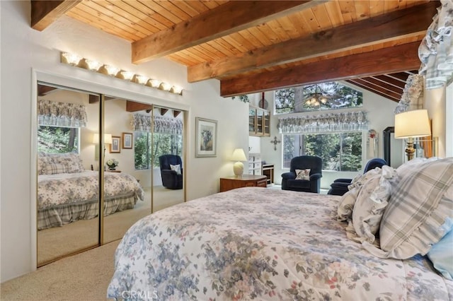 24571 Albrun Dr, Crestline, CA 92325 - bedroom featuring carpet flooring, multiple windows, and wooden ceiling with exposed beams
