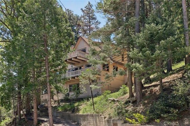 24571 Albrun Dr, Crestline, CA 92325 - view of building exterior featuring stairway
