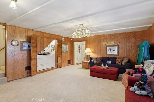 24571 Albrun Dr, Crestline, CA 92325 - carpeted living area featuring wooden walls and a chandelier
