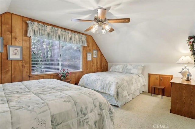 24571 Albrun Dr, Crestline, CA 92325 - carpeted bedroom featuring lofted ceiling, wood walls, and ceiling fan