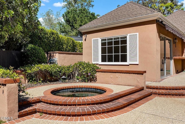 525 Laguna Rd, Pasadena, CA 91105 - view of patio / terrace with fence and an in-ground hot tub