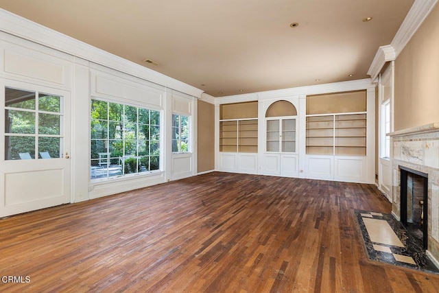 525 Laguna Rd, Pasadena, CA 91105 - unfurnished living room with ornamental molding, wood-type flooring, built in features, and a premium fireplace