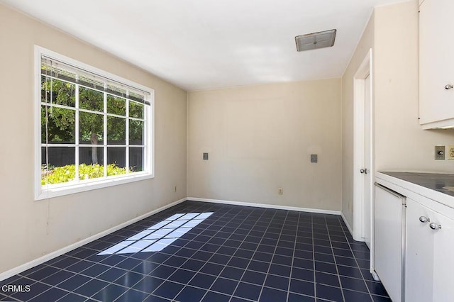525 Laguna Rd, Pasadena, CA 91105 - spare room with dark tile patterned flooring and baseboards