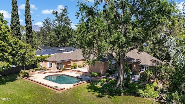 525 Laguna Rd, Pasadena, CA 91105 - rear view of property with an in-ground hot tub, stucco siding, a pool, and a patio