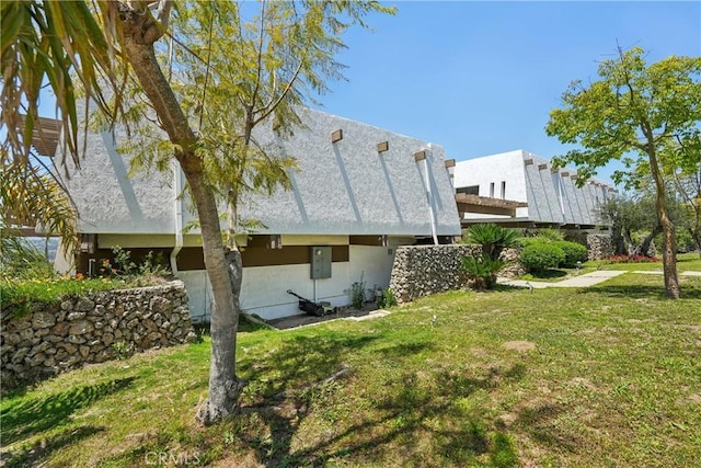 22702 Timbertop Ln, Diamond Bar, CA 91765 - rear view of house featuring a lawn and stucco siding