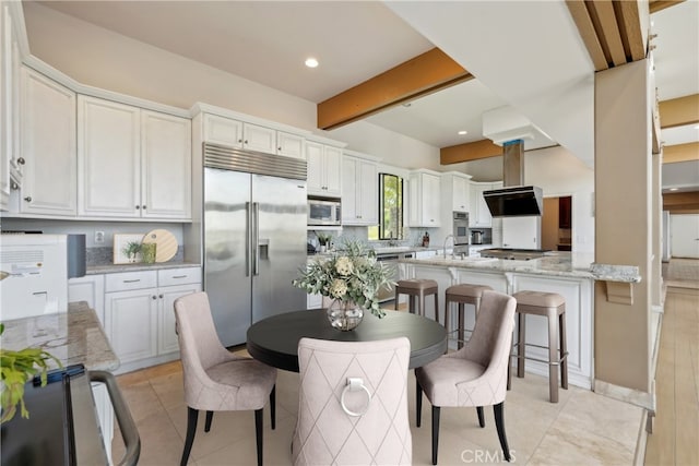 22702 Timbertop Ln, Diamond Bar, CA 91765 - dining area featuring beam ceiling, recessed lighting, and light tile patterned floors