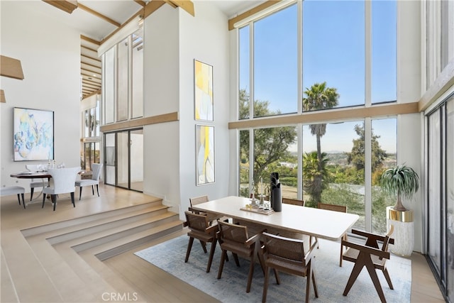 22702 Timbertop Ln, Diamond Bar, CA 91765 - dining room featuring a high ceiling and light wood finished floors