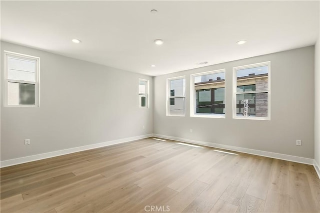 208 Stage, Irvine, CA 92618 - unfurnished room featuring light wood-type flooring and recessed lighting