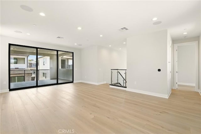 208 Stage, Irvine, CA 92618 - spare room with light wood finished floors and recessed lighting