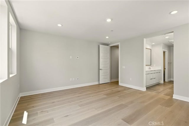 208 Stage, Irvine, CA 92618 - spare room featuring light wood finished floors and recessed lighting