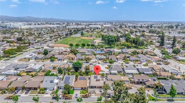 view of property location featuring nearby suburban area and mountains
