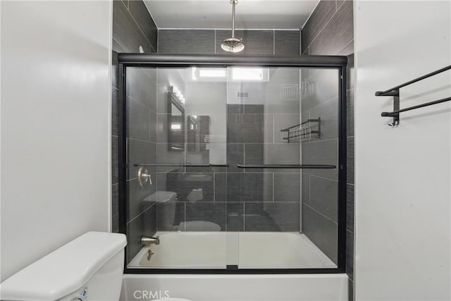 full bath featuring a combined bath / shower with rainfall shower and toilet