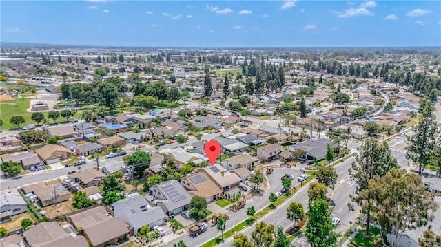aerial view of property's location with nearby suburban area