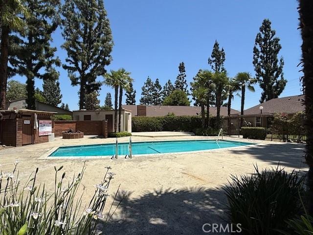 1453 W 7th St, Upland, CA 91786 - community pool with a patio area and fence