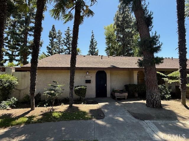 1453 W 7th St, Upland, CA 91786 - ranch-style house featuring stucco siding