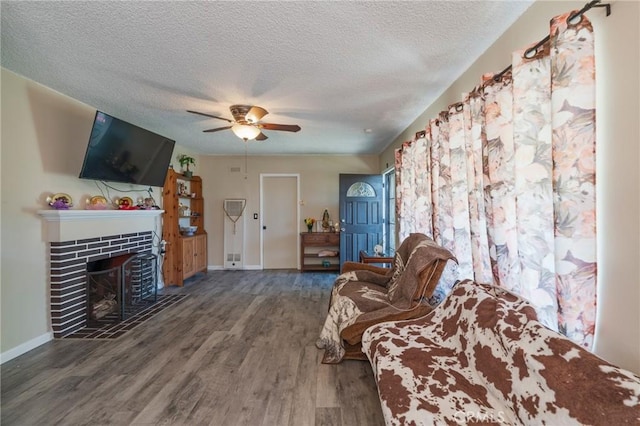 1763 W 245th St, Torrance, CA 90501 - living area featuring wood finished floors, baseboards, ceiling fan, a textured ceiling, and a tile fireplace