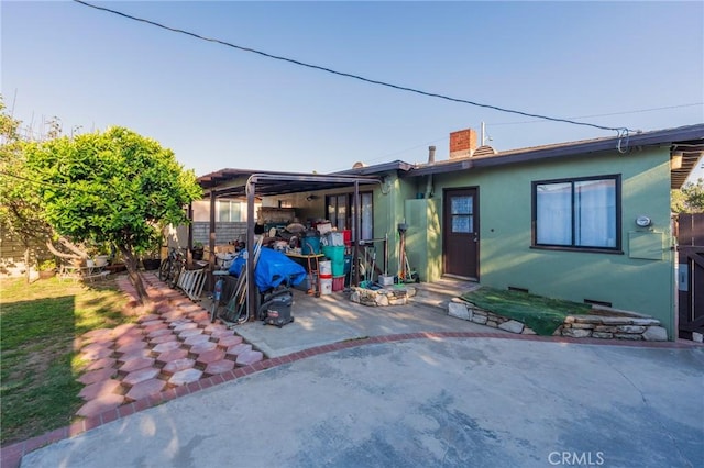 1763 W 245th St, Torrance, CA 90501 - back of house with stucco siding and a patio