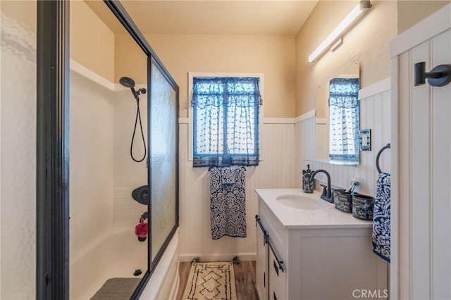 1763 W 245th St, Torrance, CA 90501 - bathroom with vanity, a wainscoted wall, shower / washtub combination, and wood finished floors