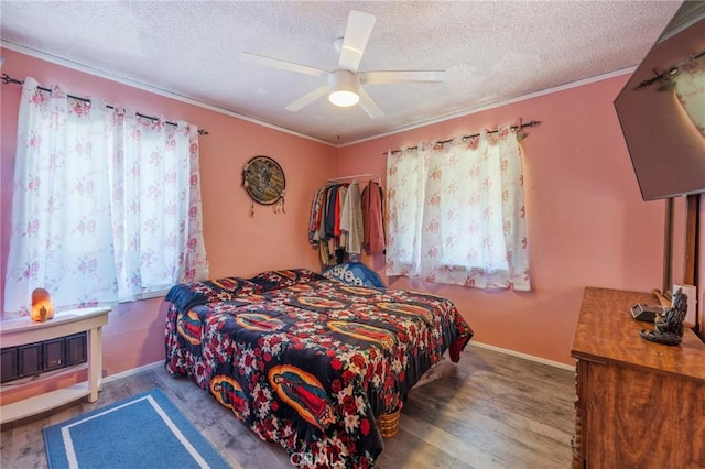 1763 W 245th St, Torrance, CA 90501 - bedroom with a textured ceiling, crown molding, a ceiling fan, baseboards, and wood finished floors