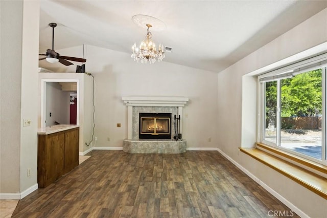 8825 Old Santa Rosa Rd, Atascadero, CA 93422 - unfurnished living room featuring lofted ceiling, wood finished floors, a high end fireplace, ceiling fan, and baseboards