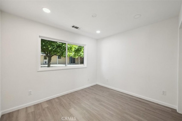 8825 Old Santa Rosa Rd, Atascadero, CA 93422 - empty room with wood finished floors, recessed lighting, and baseboards