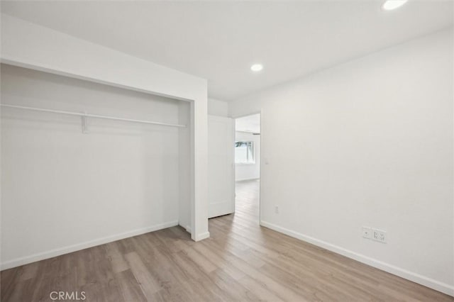 8825 Old Santa Rosa Rd, Atascadero, CA 93422 - unfurnished bedroom with recessed lighting, wood finished floors, baseboards, and a closet