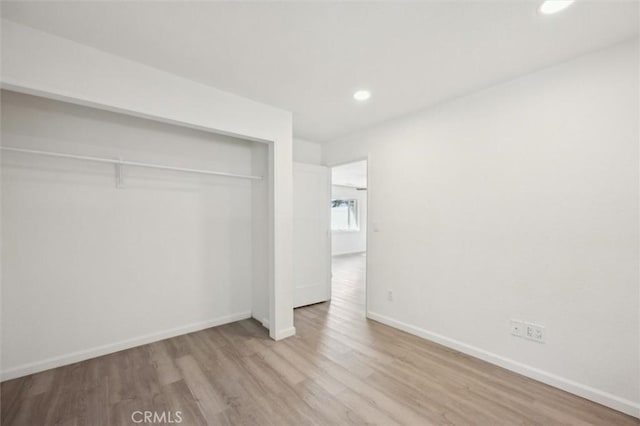 8825 Old Santa Rosa Rd, Atascadero, CA 93422 - unfurnished bedroom featuring recessed lighting, wood finished floors, and a closet