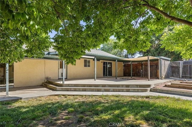 8825 Old Santa Rosa Rd, Atascadero, CA 93422 - rear view of property featuring stucco siding and a patio