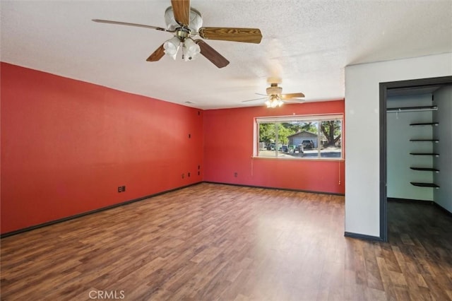 8825 Old Santa Rosa Rd, Atascadero, CA 93422 - unfurnished room with wood finished floors, ceiling fan, and baseboards