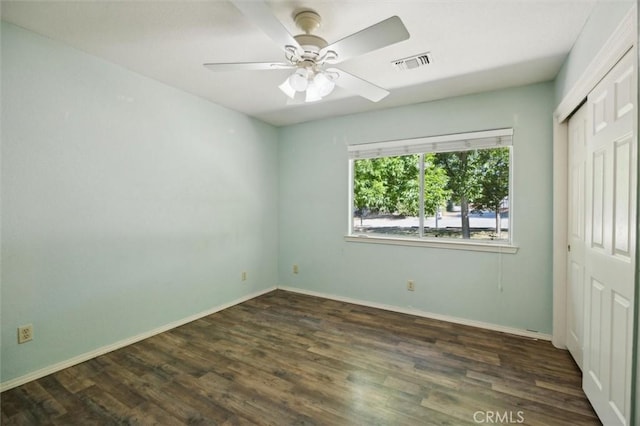 8825 Old Santa Rosa Rd, Atascadero, CA 93422 - unfurnished bedroom featuring a closet, wood finished floors, and baseboards