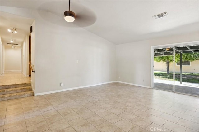 8825 Old Santa Rosa Rd, Atascadero, CA 93422 - spare room featuring vaulted ceiling, ceiling fan, light tile patterned floors, and baseboards