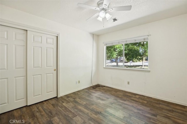 8825 Old Santa Rosa Rd, Atascadero, CA 93422 - unfurnished bedroom featuring wood finished floors, baseboards, and a closet