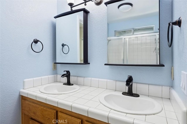 8825 Old Santa Rosa Rd, Atascadero, CA 93422 - bathroom with double vanity and a textured wall
