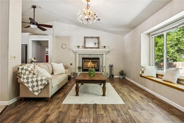 8825 Old Santa Rosa Rd, Atascadero, CA 93422 - living area featuring lofted ceiling, wood finished floors, a tiled fireplace, ceiling fan, and a chandelier