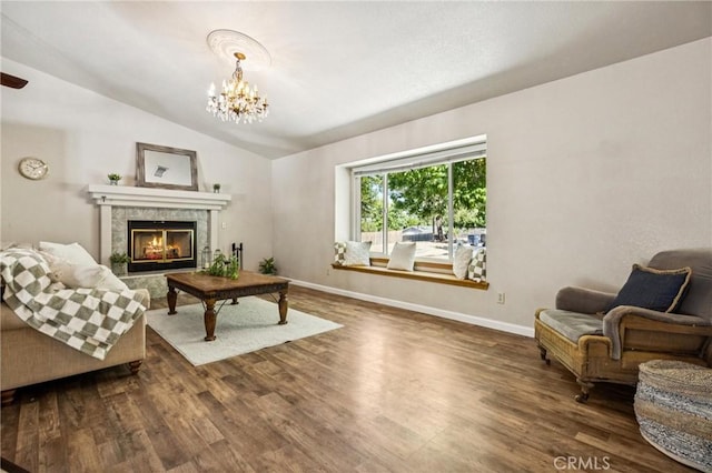 8825 Old Santa Rosa Rd, Atascadero, CA 93422 - living area featuring dark wood finished floors, lofted ceiling, a chandelier, and a tile fireplace