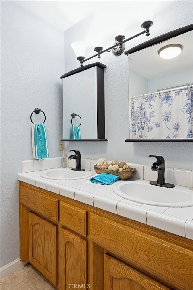 8825 Old Santa Rosa Rd, Atascadero, CA 93422 - bathroom featuring double vanity and tile patterned flooring