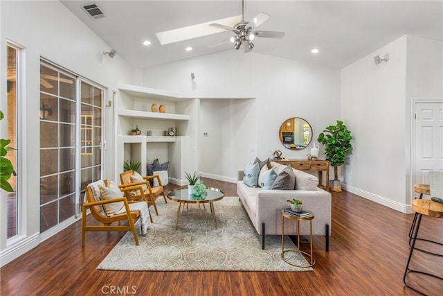 34879 Olive Tree Ln, Yucaipa, CA 92399 - living area with wood finished floors, a skylight, ceiling fan, vaulted ceiling, and baseboards