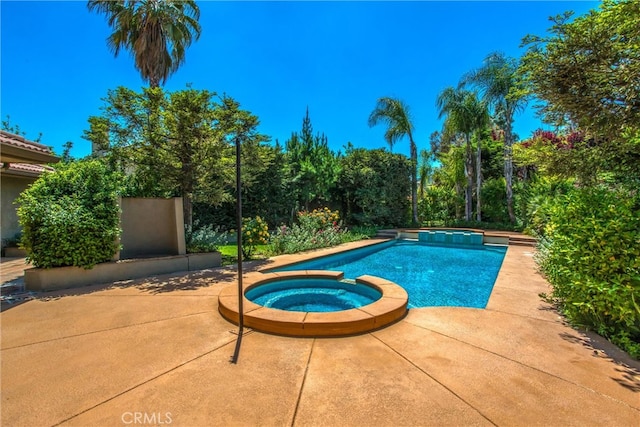 34879 Olive Tree Ln, Yucaipa, CA 92399 - view of swimming pool featuring a pool with connected hot tub and a patio area