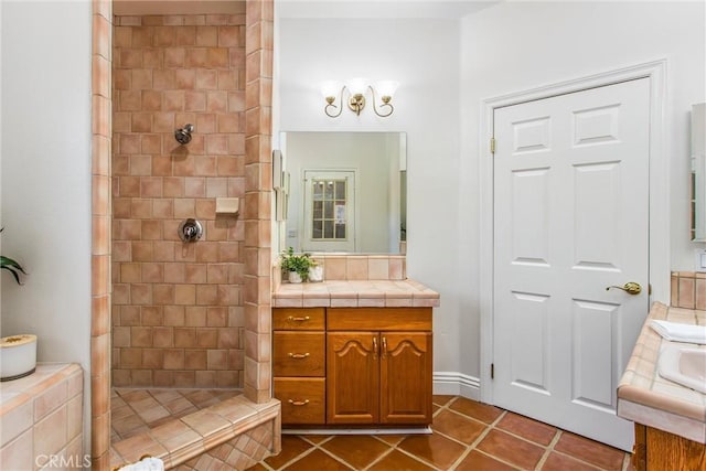 34879 Olive Tree Ln, Yucaipa, CA 92399 - bathroom featuring a walk in shower, vanity, and tile patterned floors
